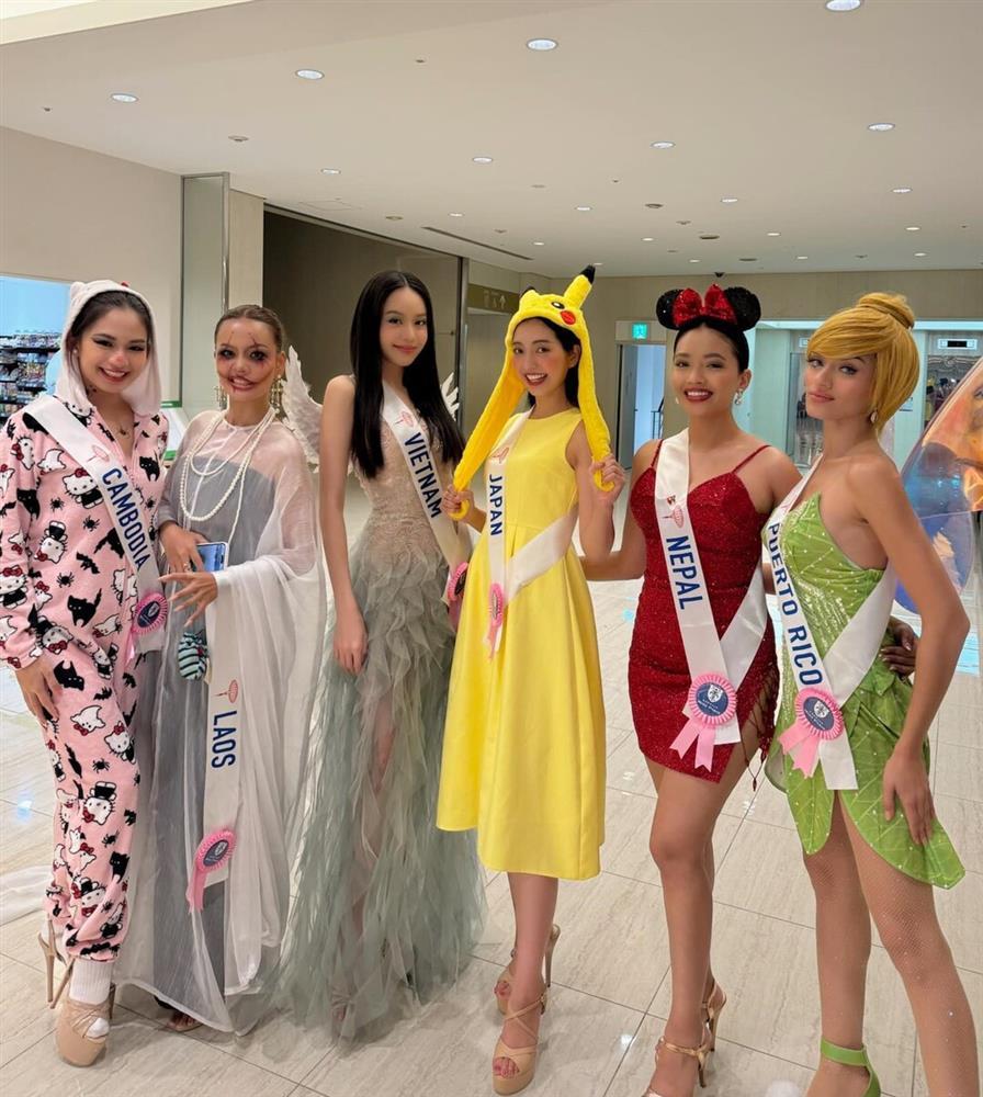 Hoa hậu Thanh Thủy mang khung cửi dệt lụa nặng 5kg diễn Miss International 2024-6